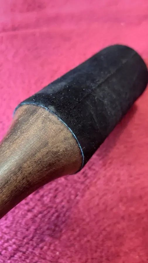 Verified buyer photo: close-up of the stitched leather head and turned hardwood handle of the mallet